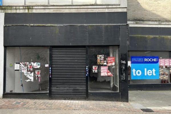 White lion storefront before